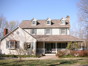 Light-colored roof on two-story home